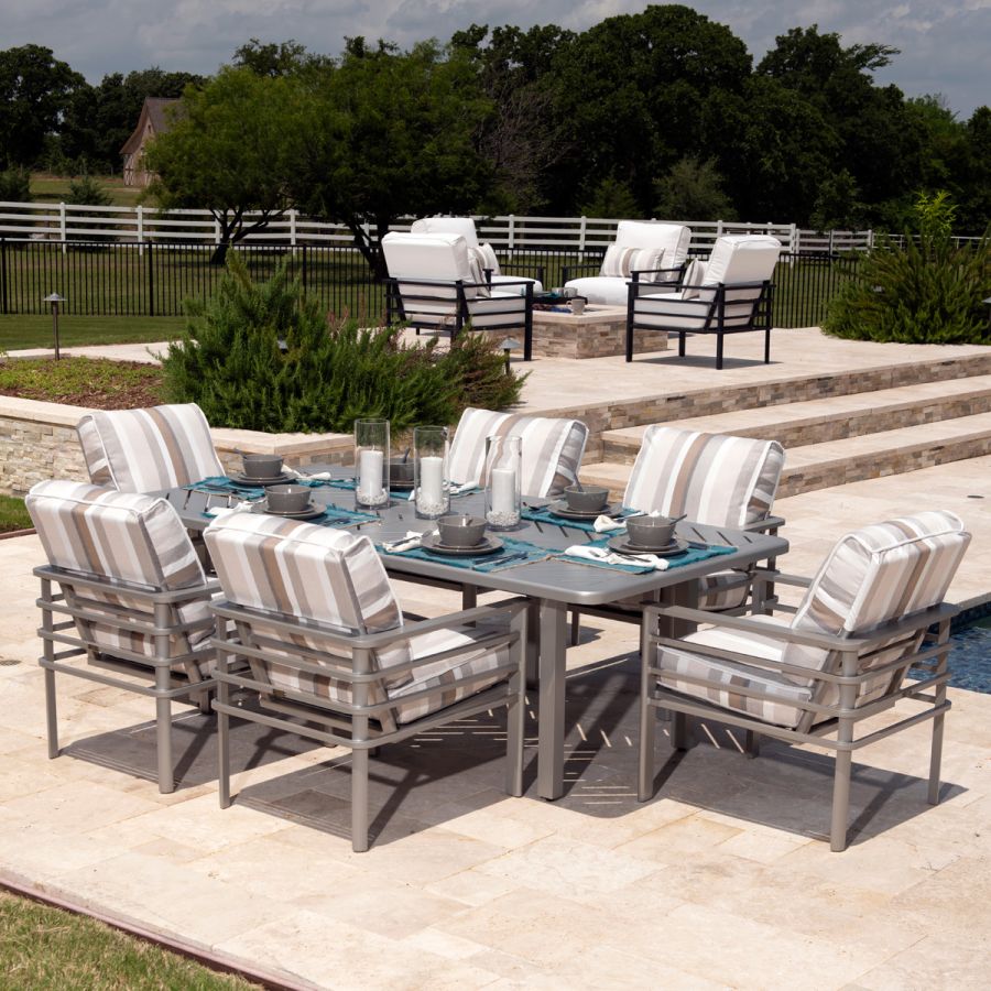 Mallin Sarasota Outdoor Club Chairs around a dining table
