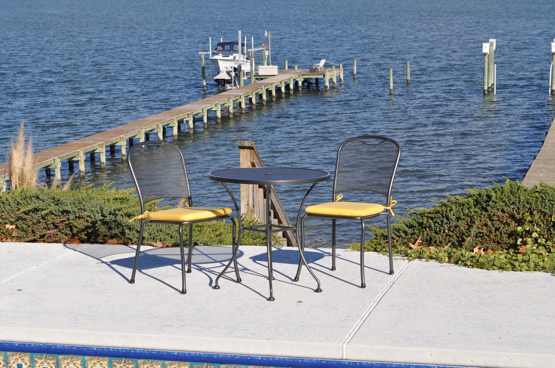 Kettler Monte Carlo Outdoor Side Chair around a table