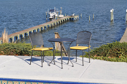 Kettler Monte Carlo Outdoor Side Chair around a table