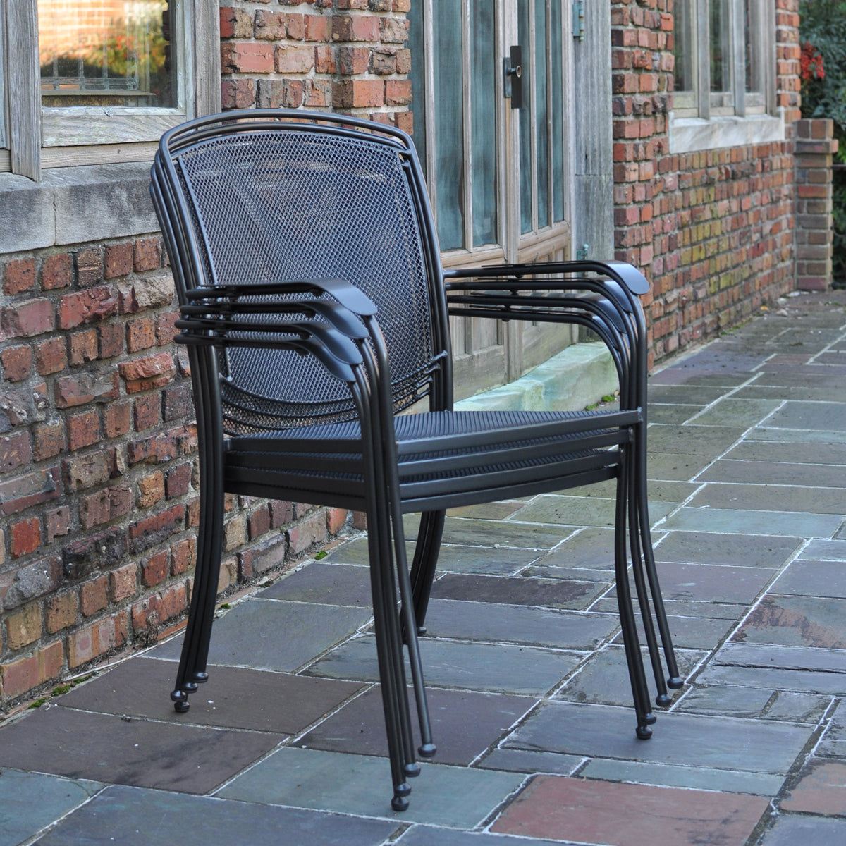 Kettler Henley Outdoor Dining Arm Chai Stacked on each other